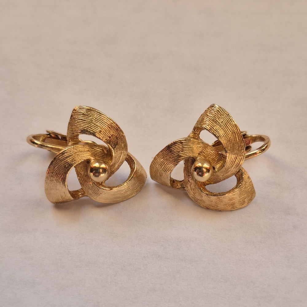 Vintage gold tone swirl clip-on earrings